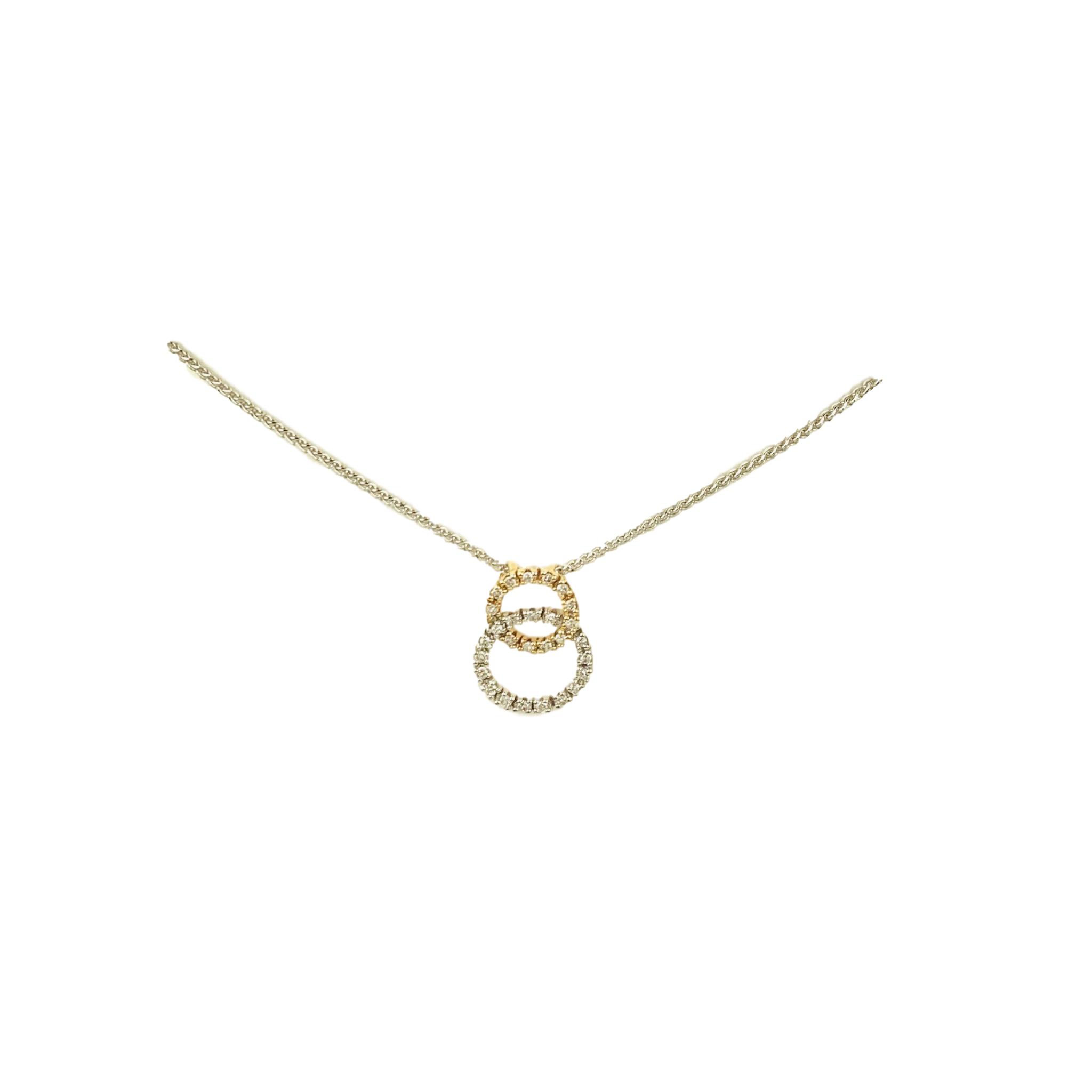 14 Karat Two Tone Diamond Circle Pendant - Jonesville & Gainesville, FL